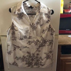 White blouse with brown flower design